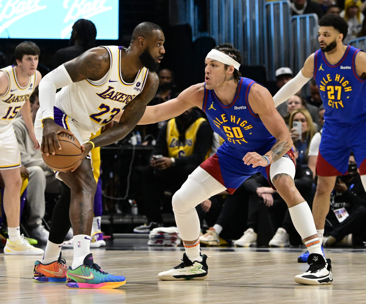 猛龙鏖战灰熊,詹姆斯带队取胜 猛龙鏖战灰熊,詹姆斯带队取胜